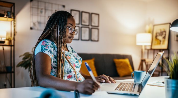 African American female student studying from home during lockdown